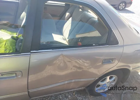 1999 Toyota Camry Le from USA, damaged, VIN 4T1BG22K5XU488052